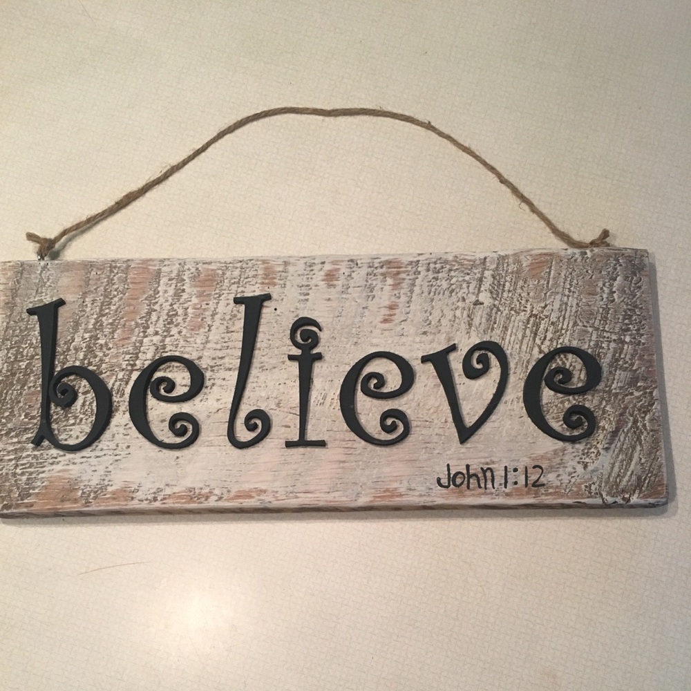 Believe wood sign.